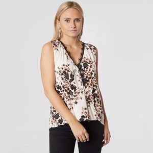 Daytrip Floral White Surplice High Low Hem Tank Top Size: L